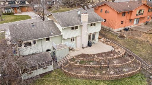 Terraced perennial garden, gazebo with hot tub and just the right of green space in the backyard