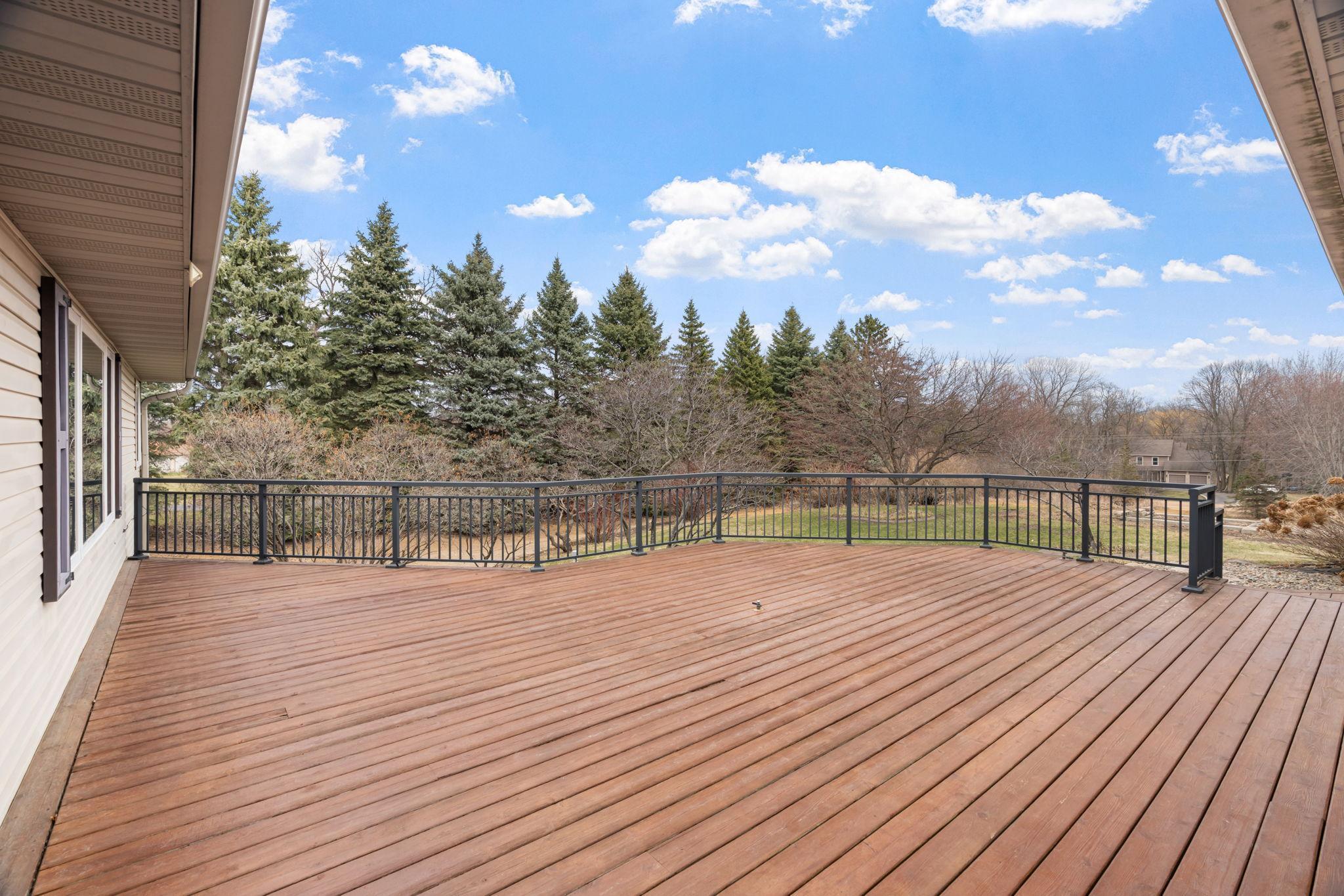 Large expansive deck perfect for the summer days. Gas hook up for fireplace in the middle