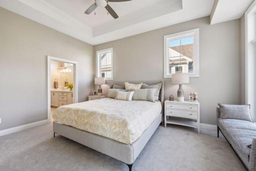 Main Floor Owners Suite with Raised Ceiling.jpg