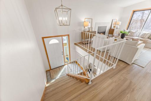 Such an open, inviting entry! NEW light fixtures everywhere!