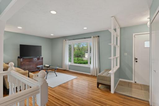 Sunny and inviting living room. Bask in the morning sun overlooking your flower beds.