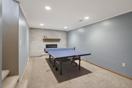 Awesome basement entertaining space. Enjoy game nights in this space!