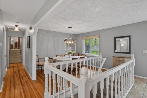 Large dining area with built-in glass display hutch perfect for holiday hosting!