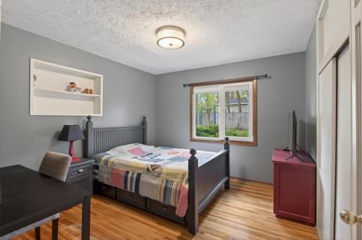 1st of 4 bedrooms. Lots of closet space and overlooks the fully fenced in yard