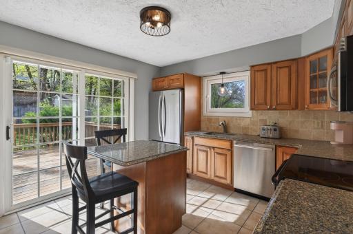 Another view of the kitchen. Check out the window over the sink!