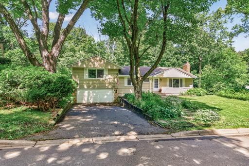 Driveway leading to the 2 car garage.