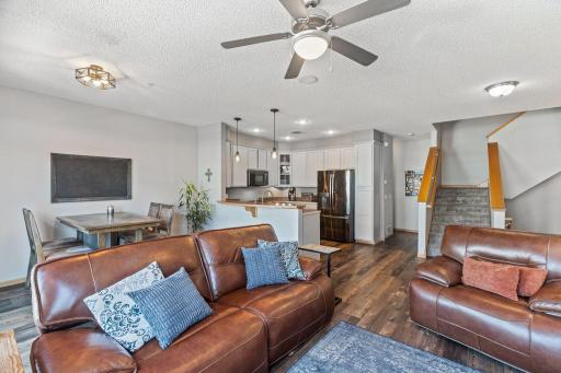 Beyond the far side of the kitchen is the half bathroom.