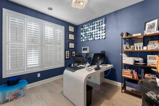 Two additional bedrooms are filled with natural light.
