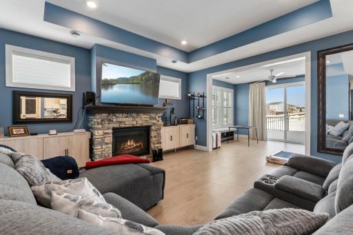 Inside, a bright and open floor plan is enhanced by 9-foot ceilings and seamless sightlines, creating an inviting space for both everyday living and entertaining.