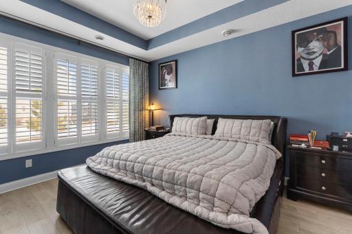 The thoughtfully designed split-bedroom layout provides added privacy, with the primary suite tucked away as a relaxing retreat.