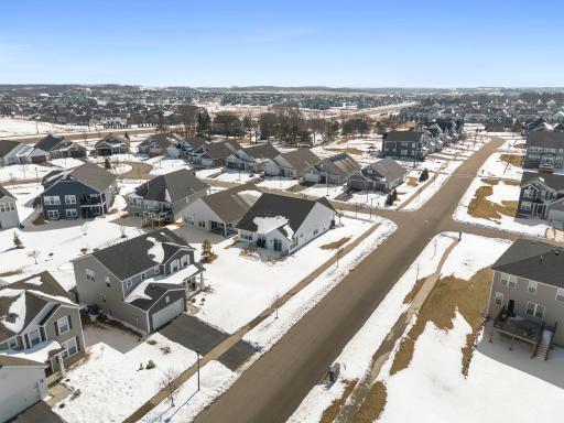 Ideally situated on a desirable corner lot, the home is just minutes from Prestwick Golf Club, East Ridge High School, and an abundance of parks, lakes, and scenic walking paths.