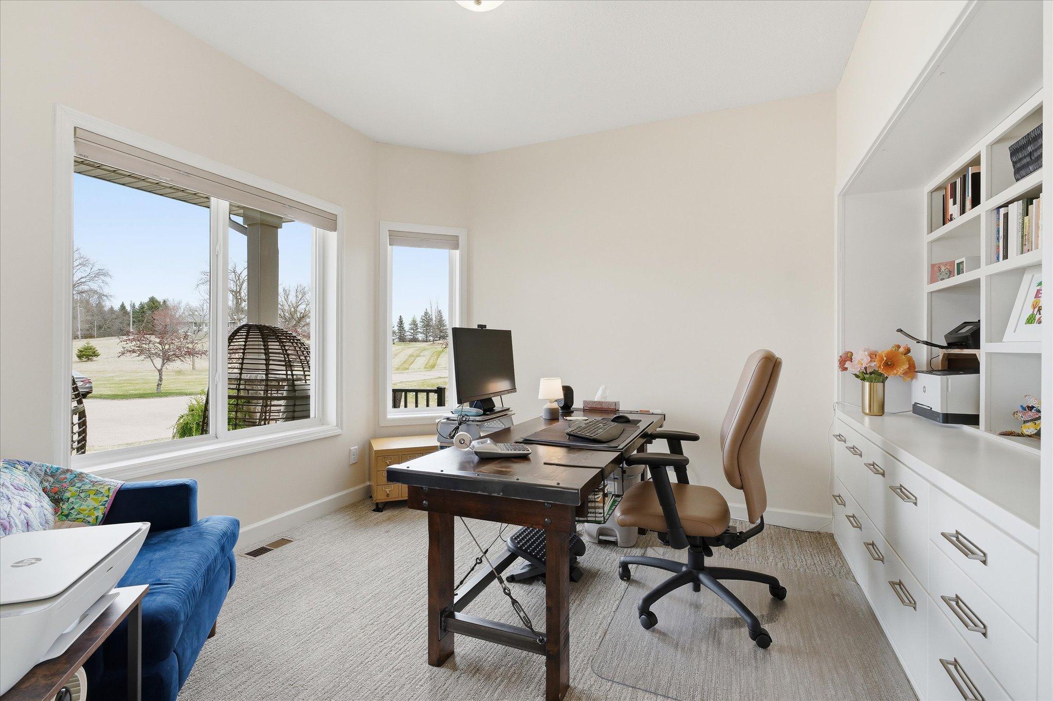 Bedroom 2 or wait... the custom designed built-ins make this space perfect for the ultimate home office!