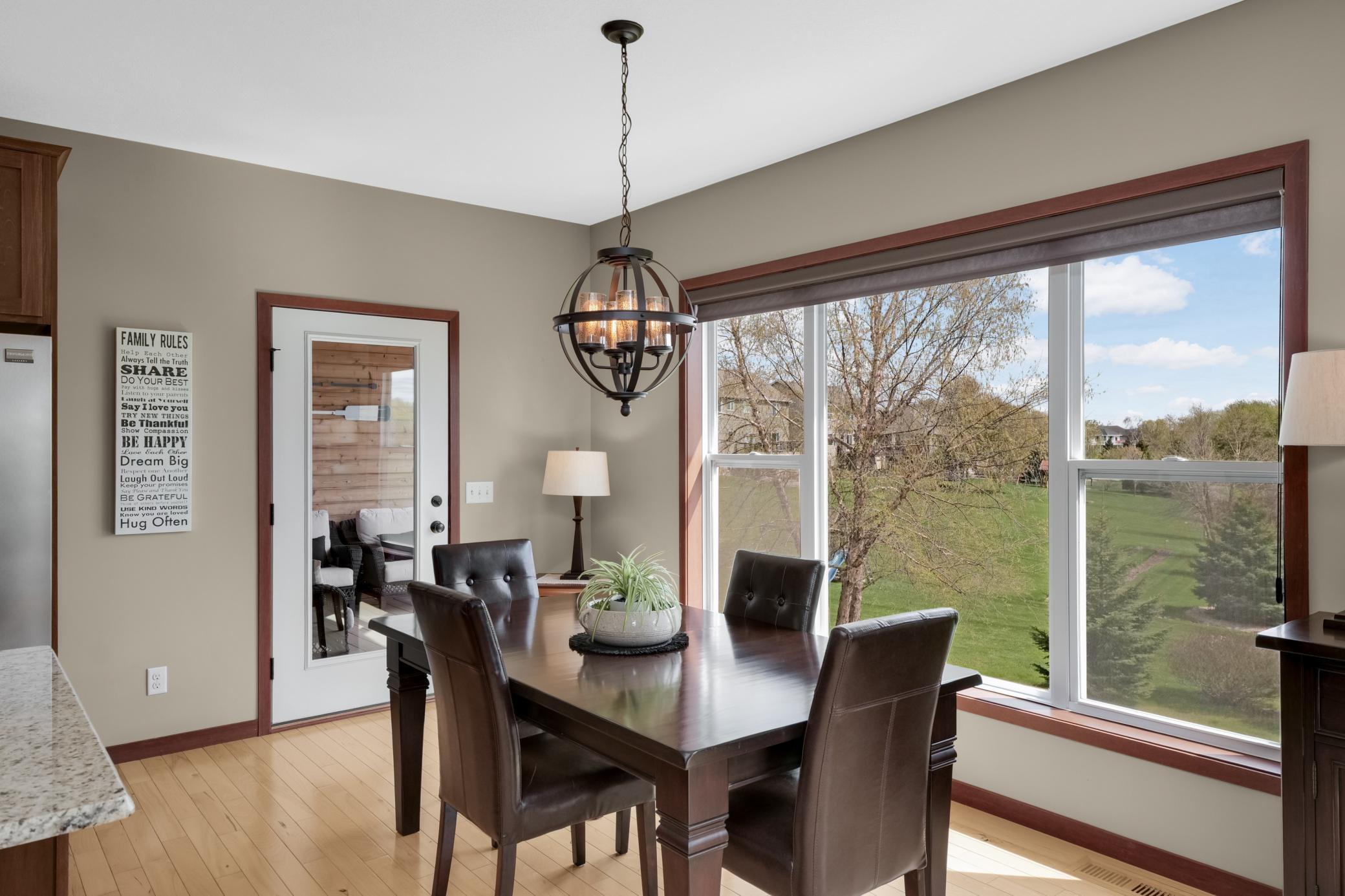 Enjoy expansive views from the dining room, which also provides easy access to the three-season porch.