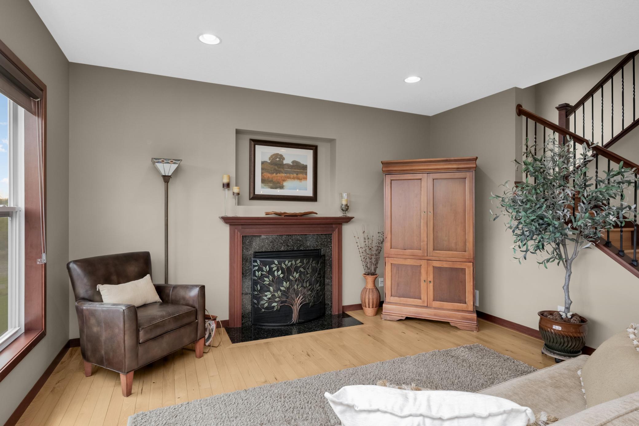 Includes a wired TV cove over the fireplace along with surround sound hookup, ideal for cozy movie nights at home.