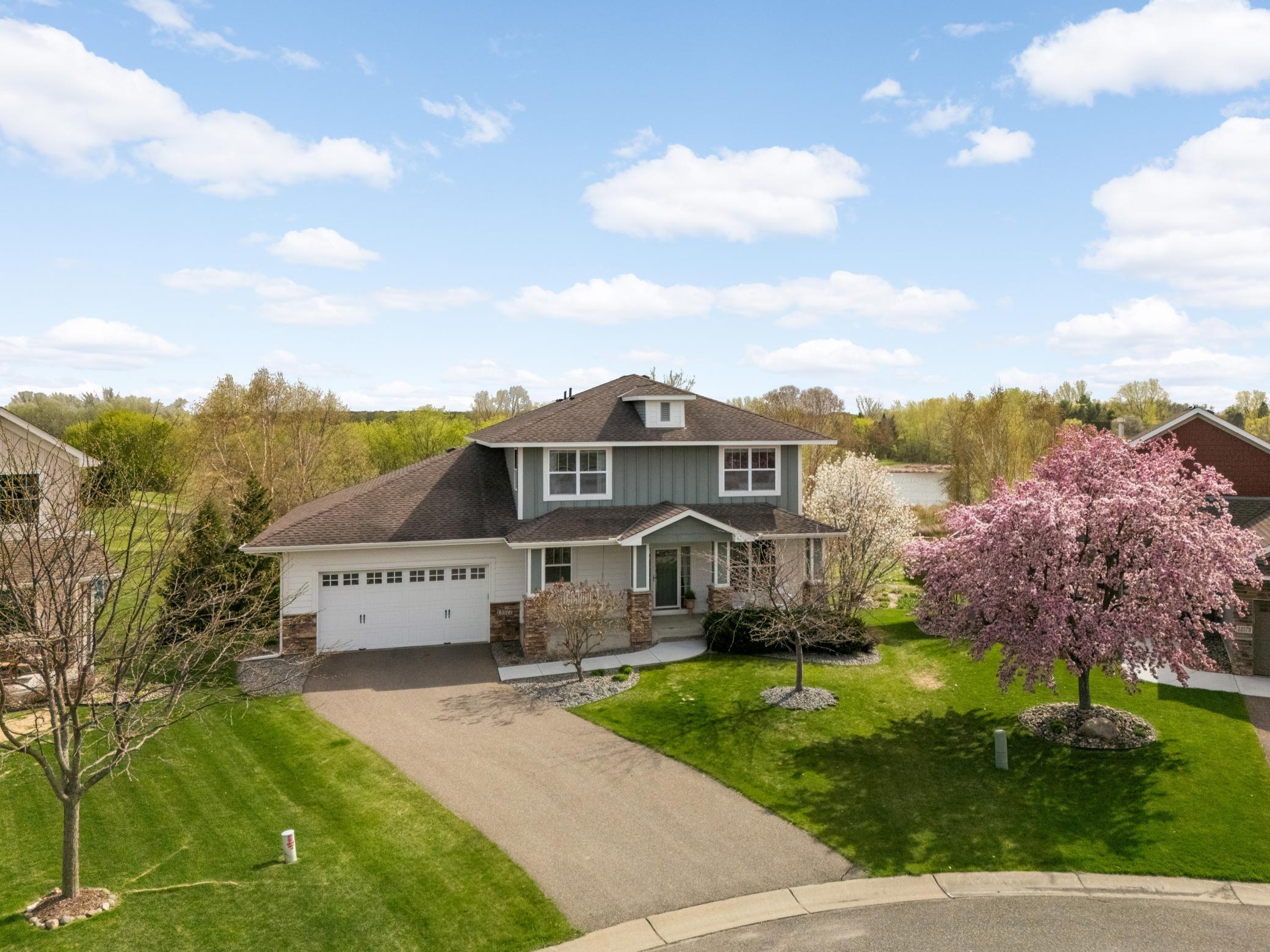 Stunning custom built walk out two story home on rarely available lake lot in Edgewater!