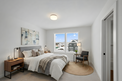 Upper level bedroom 4 (per floor plan) connected to Jack & Jill bathroom *Photo of similar home and virtually staged