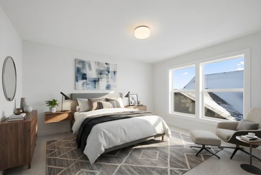Upper level bedroom 2 (per floor plan) connected to private 3/4 bathroom ensuite *Photo of similar home and virtually staged