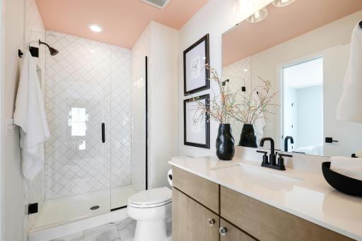 Upper level bedroom 2 private ensuite *Photo of similar home