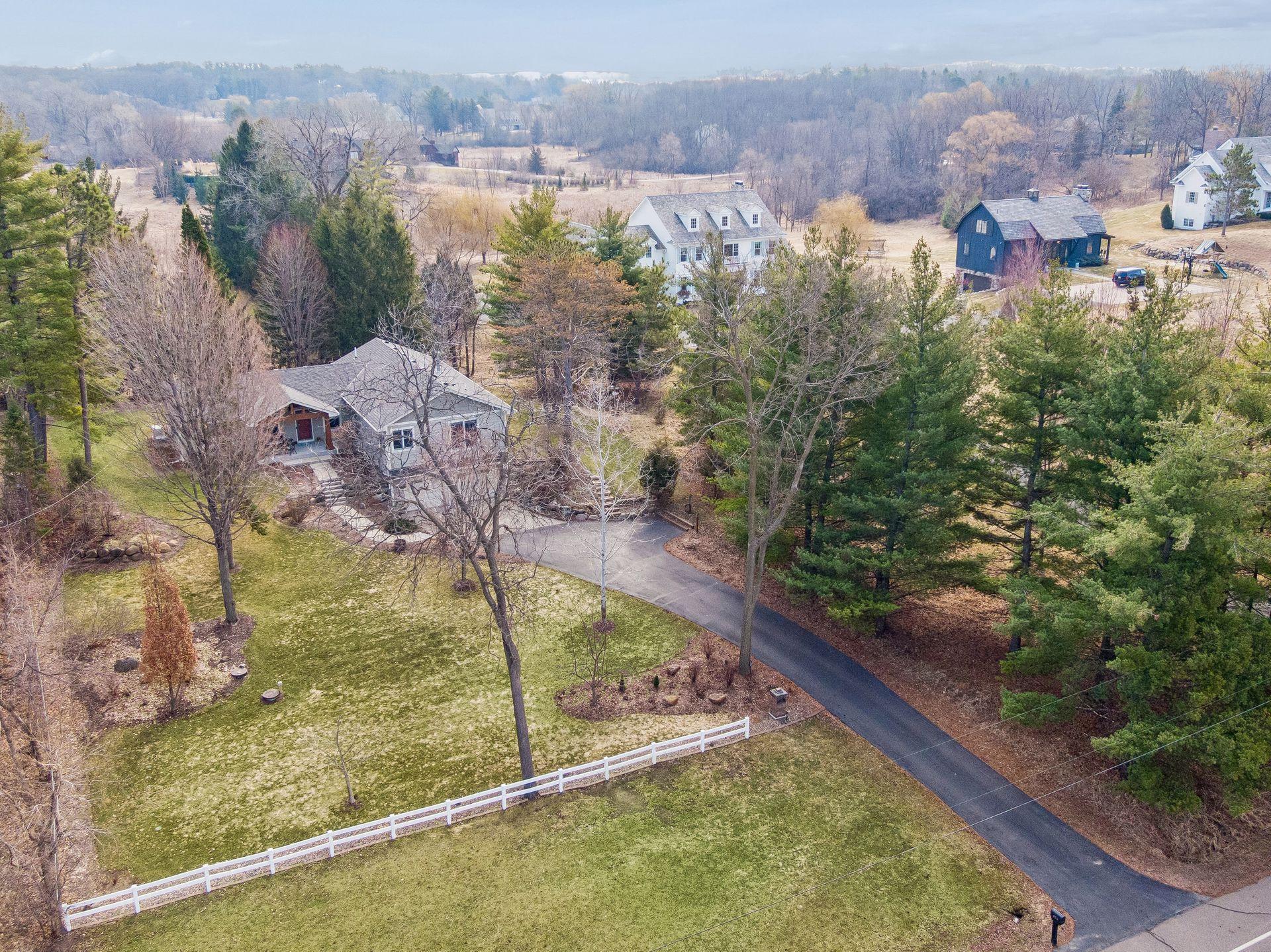 450 Willow Drive S. - This home setting has a country like feel, yet close in to Long Lake and Wayzata for shopping and restaurants.