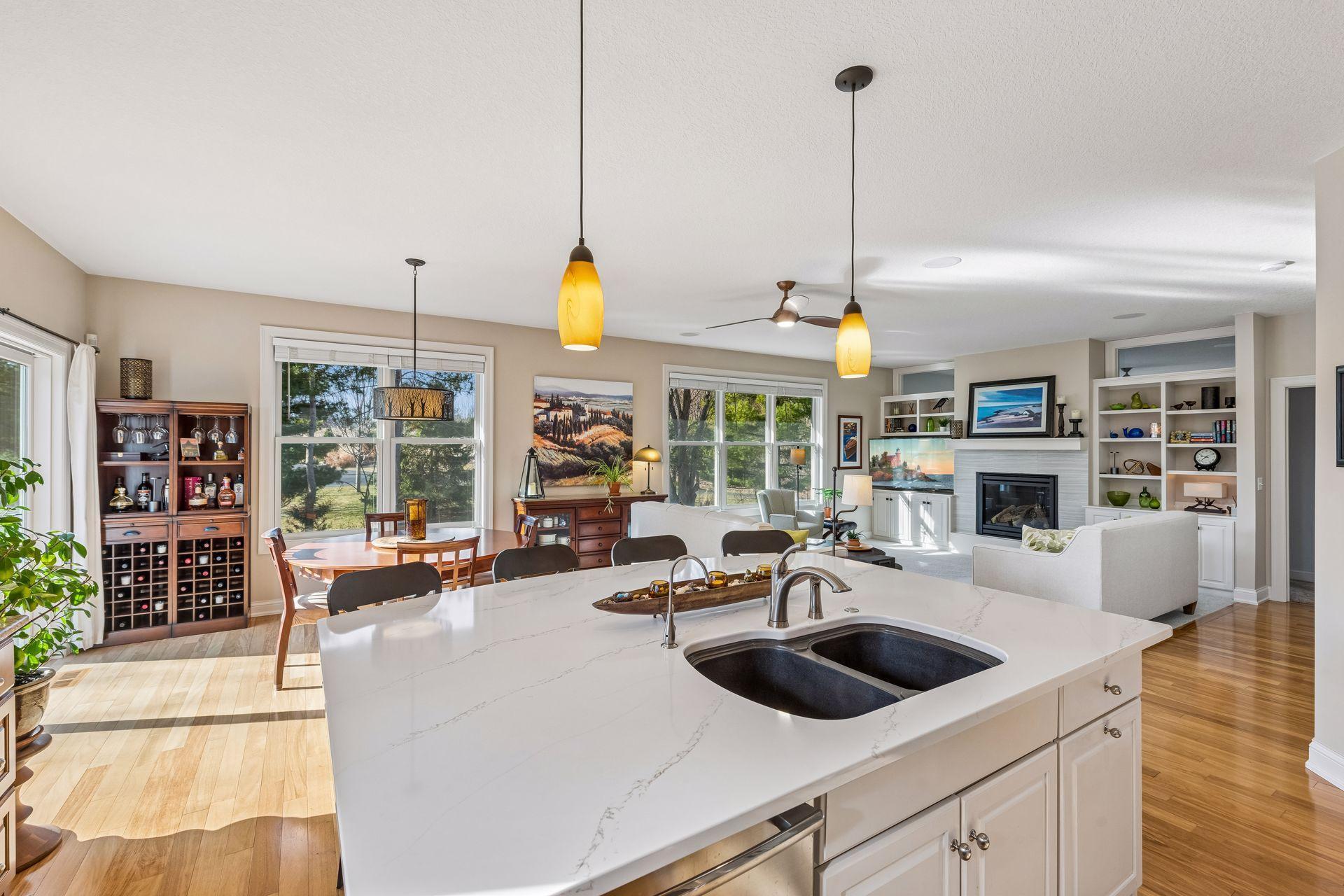 Quartz countertop, stainless steel dishwasher, filtered water spigot, granite composite sink.