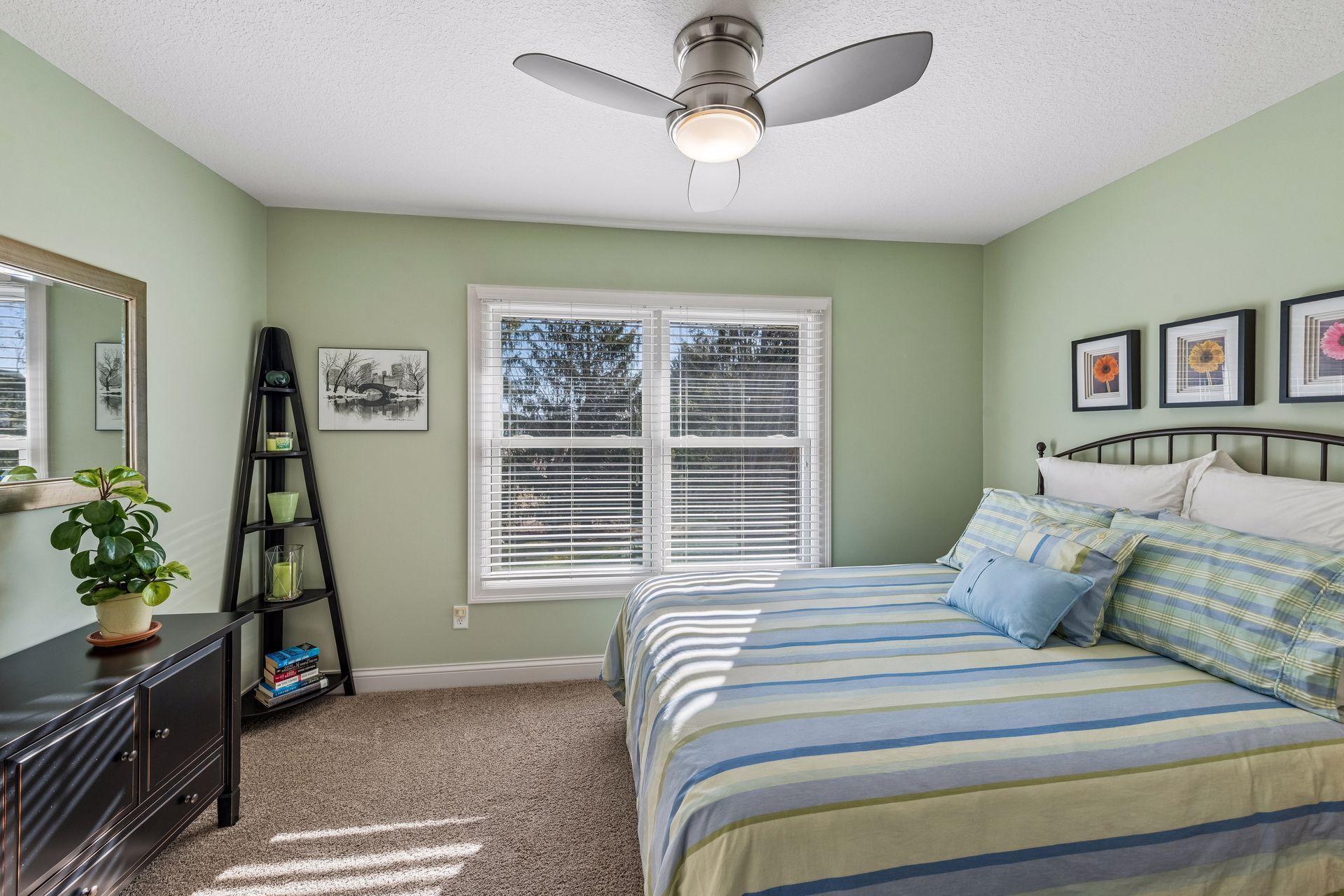 Main level bedroom #2 - 12'1' X 10'10" A full bathroom is adjacent to this bedroom.