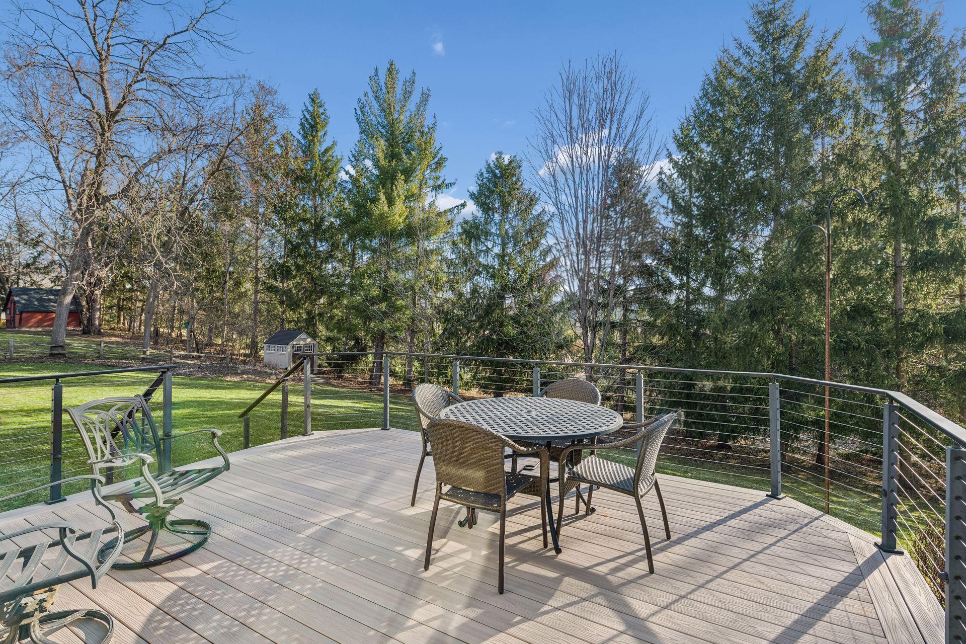 What a beautiful backyard view from deck #1. Tranquil and private. Deck is 16X18.