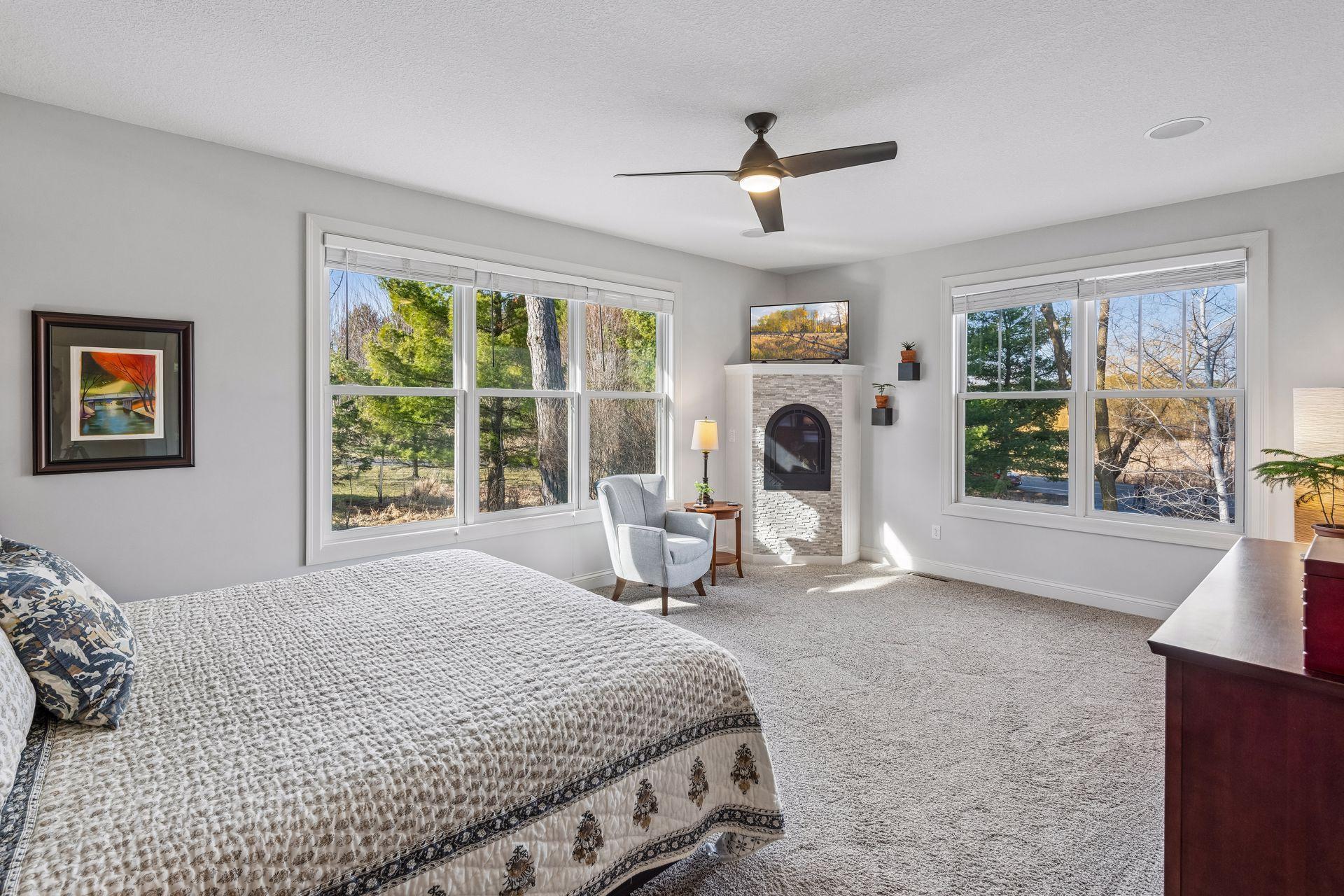 Primary bedroom- En-Suite- 17'2"X18'7" with gas fireplace and lots of natural light.