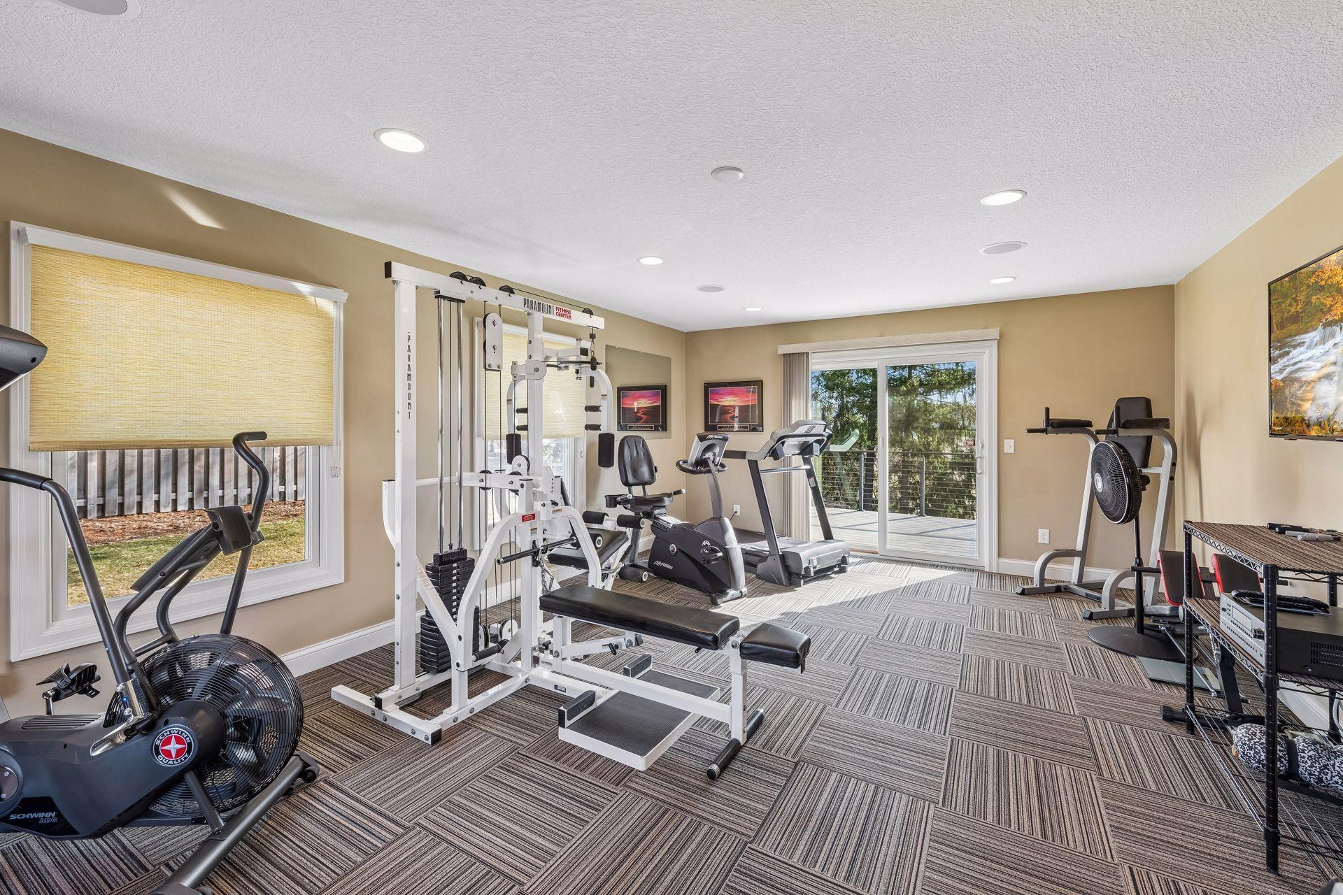 What an incredible exercise room! This room is spacious at 22'1' X 13'6'. After your work-out, take a break and walk out of this room, directly to maintenance free deck #2. Built in speakers in ceiling.