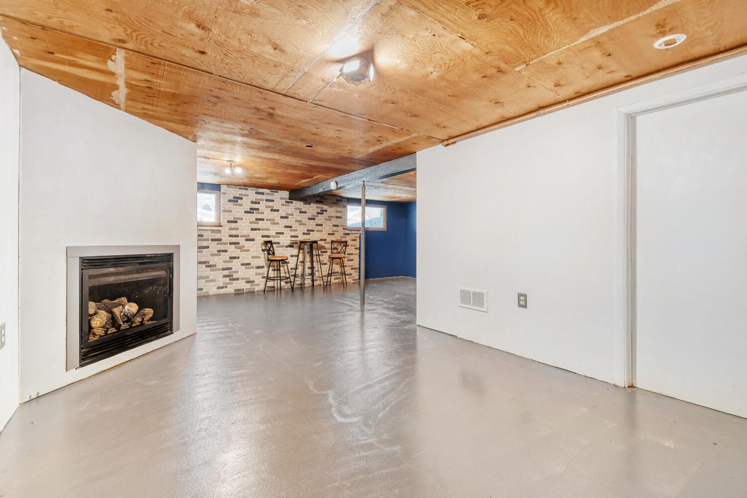 Lower level gas fireplace