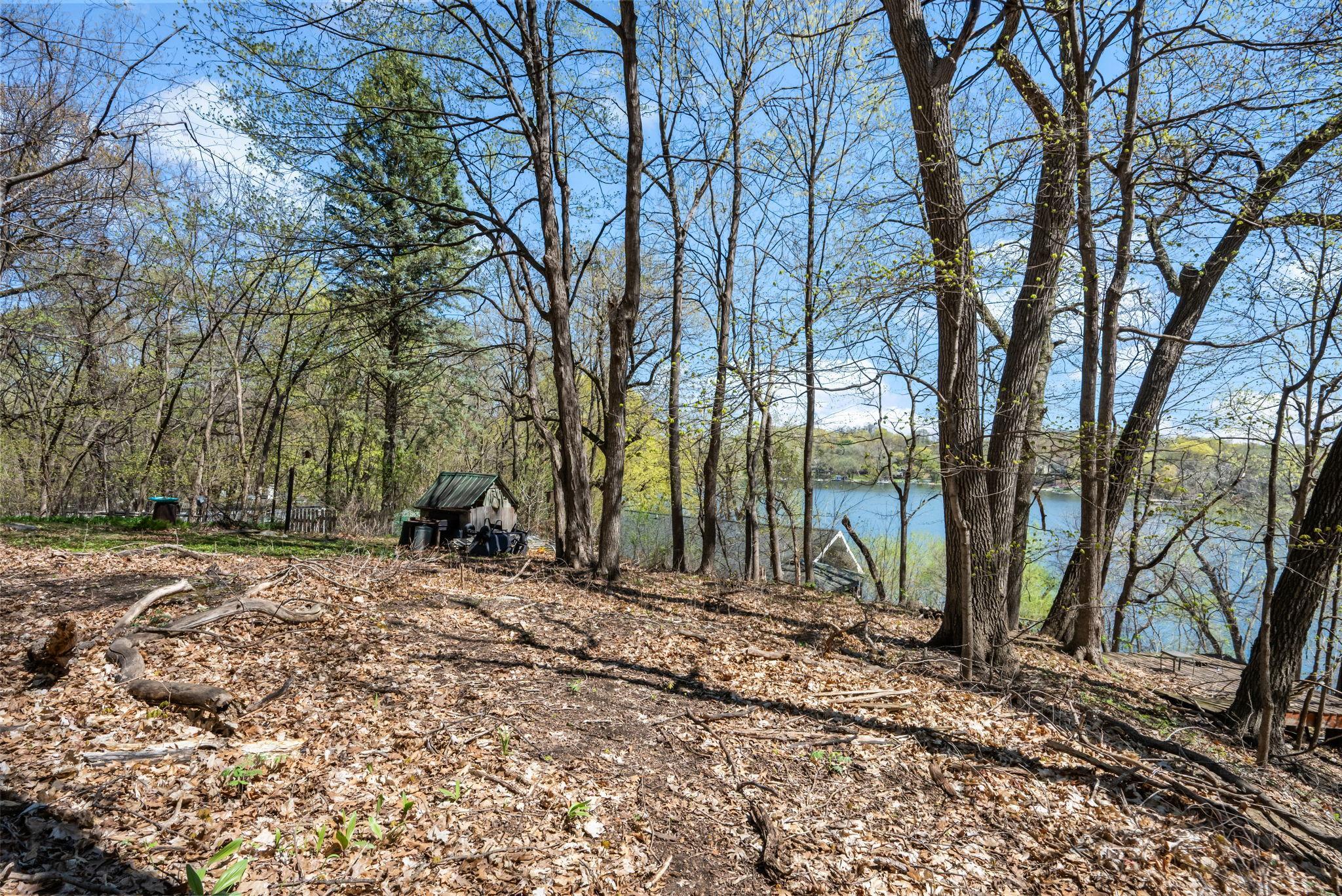 1/2+ acre lake view site to bring your building dreams alive.