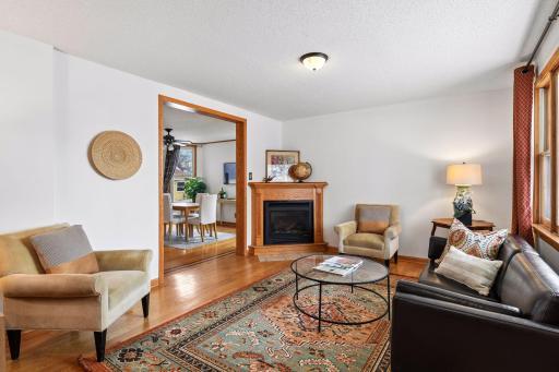 Hardwood floors and gas fireplace in the living room
