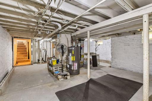 Large unfinished basement for storage, shelves, workspace