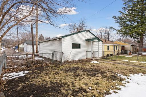 Oversized 2 car garage with additional parking pad