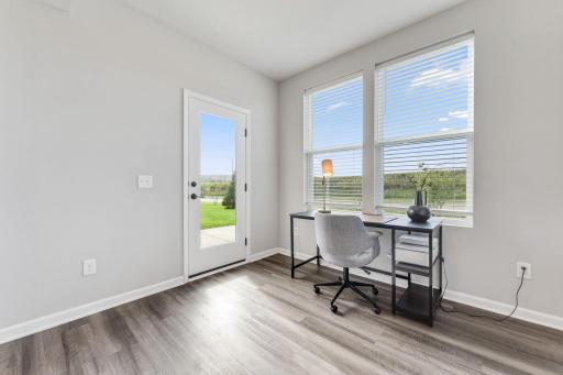 Morning room walks out to patio and is a perfect flexible space for an office, workout area or playroom!