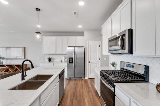 Nice cabinet space and a large pantry for extra storage