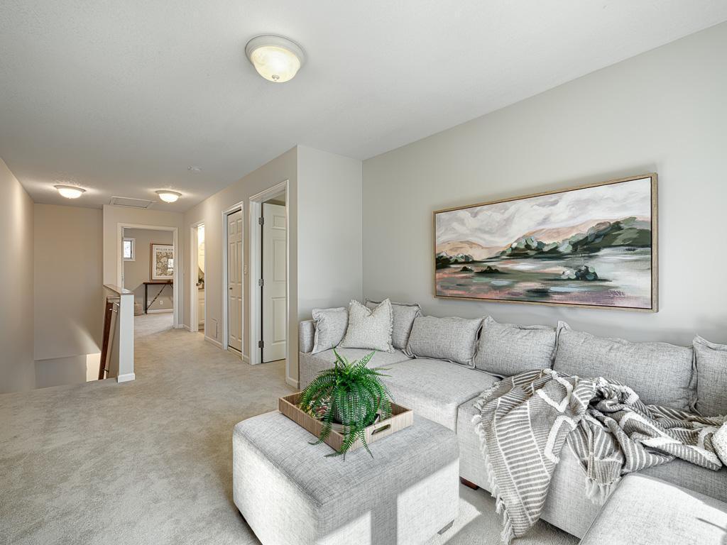 Upstairs features 2 bedrooms and 2 bathrooms