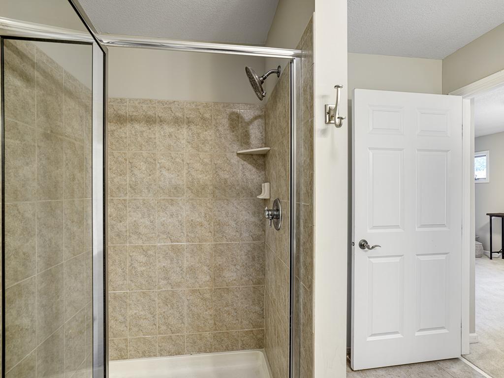 Glass enclosed tile shower