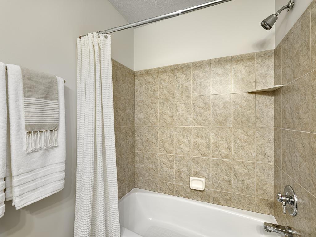 Bath with tile tub finish