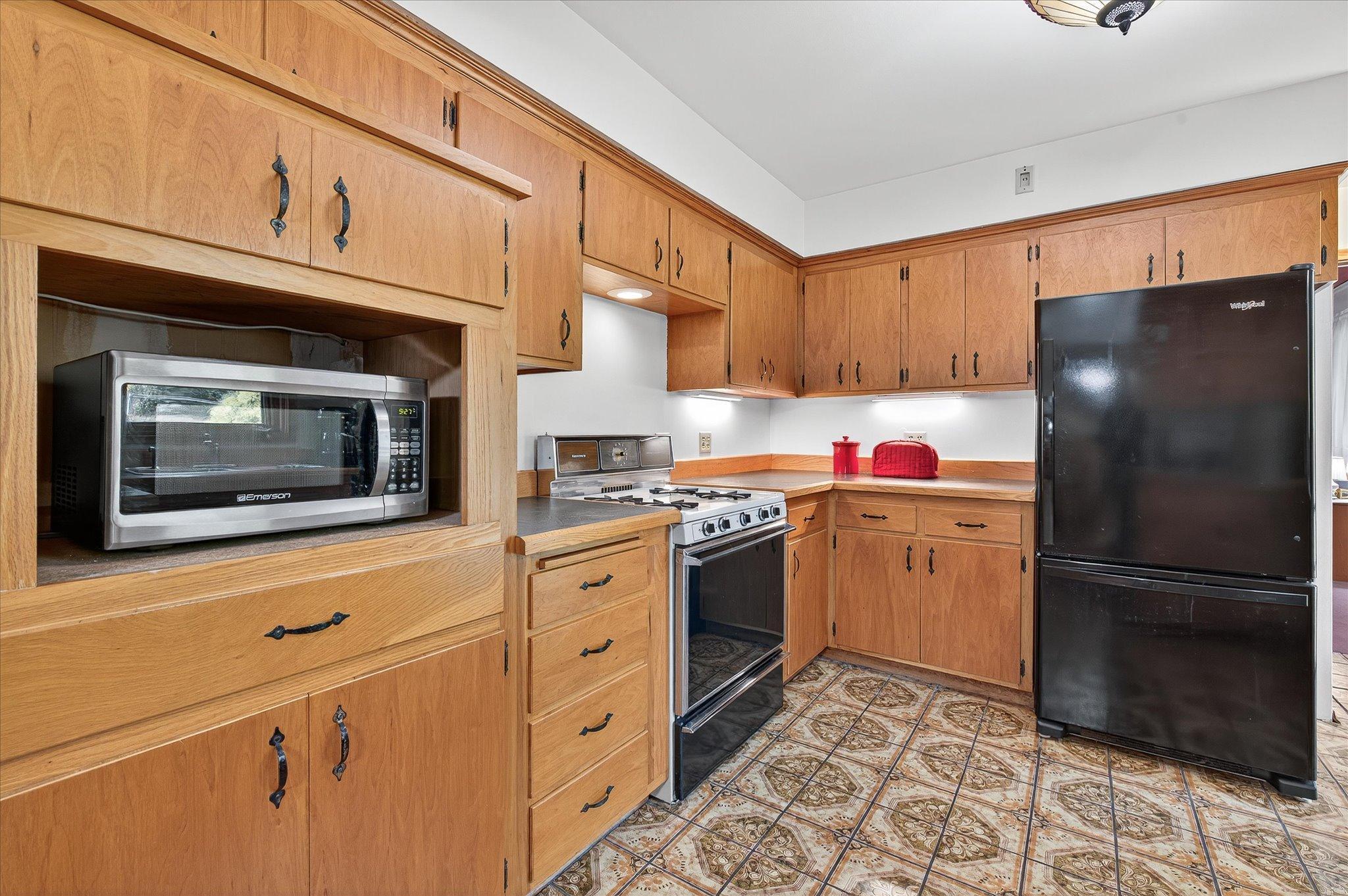 An Abundace of Cabinets in the Spacious Kitchen