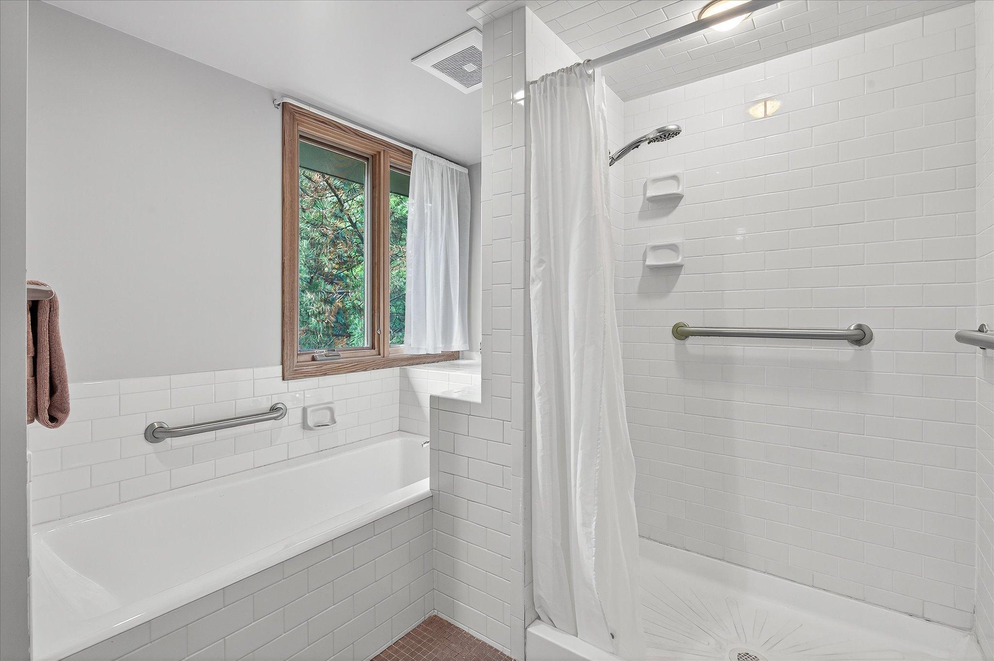 Soaking Tub and Separate Tiled Shower