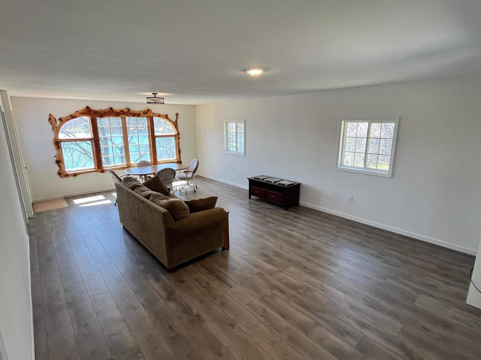 Bonus space, finished square footage not included in the listing finished square footage of the home. Above the detached garage with lake views, also a bedroom and storage space finished.