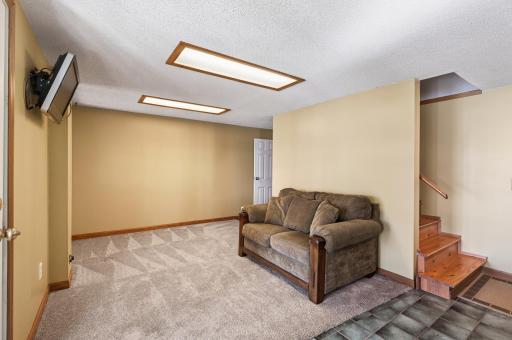 This family room area, could easily be converted to another bedroom and it has a full window that looks out the the lake!
