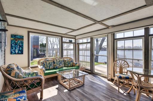 Come on in and relax in the 3 season porch. Views in every direction. Room for dining or relaxing.
