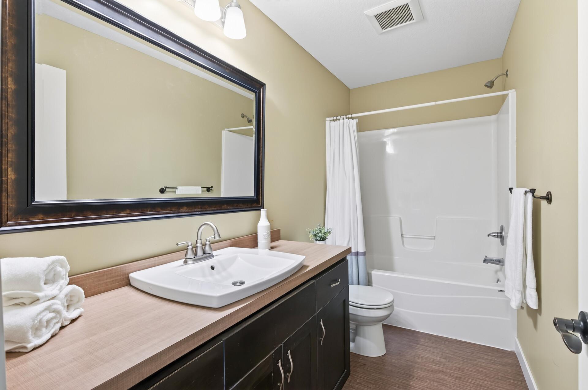 A full bathroom serves the secondary bedrooms with ease.
