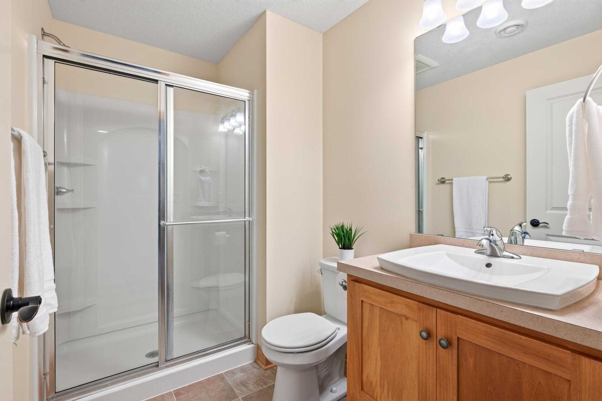 An additional full bathroom adds convenience for guests and everyday living.