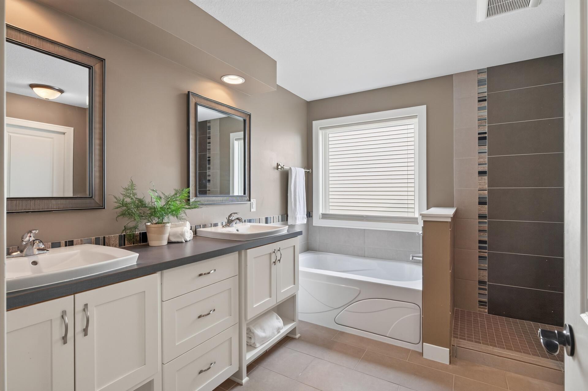 Relax and recharge in the spacious, updated ensuite bathroom.
