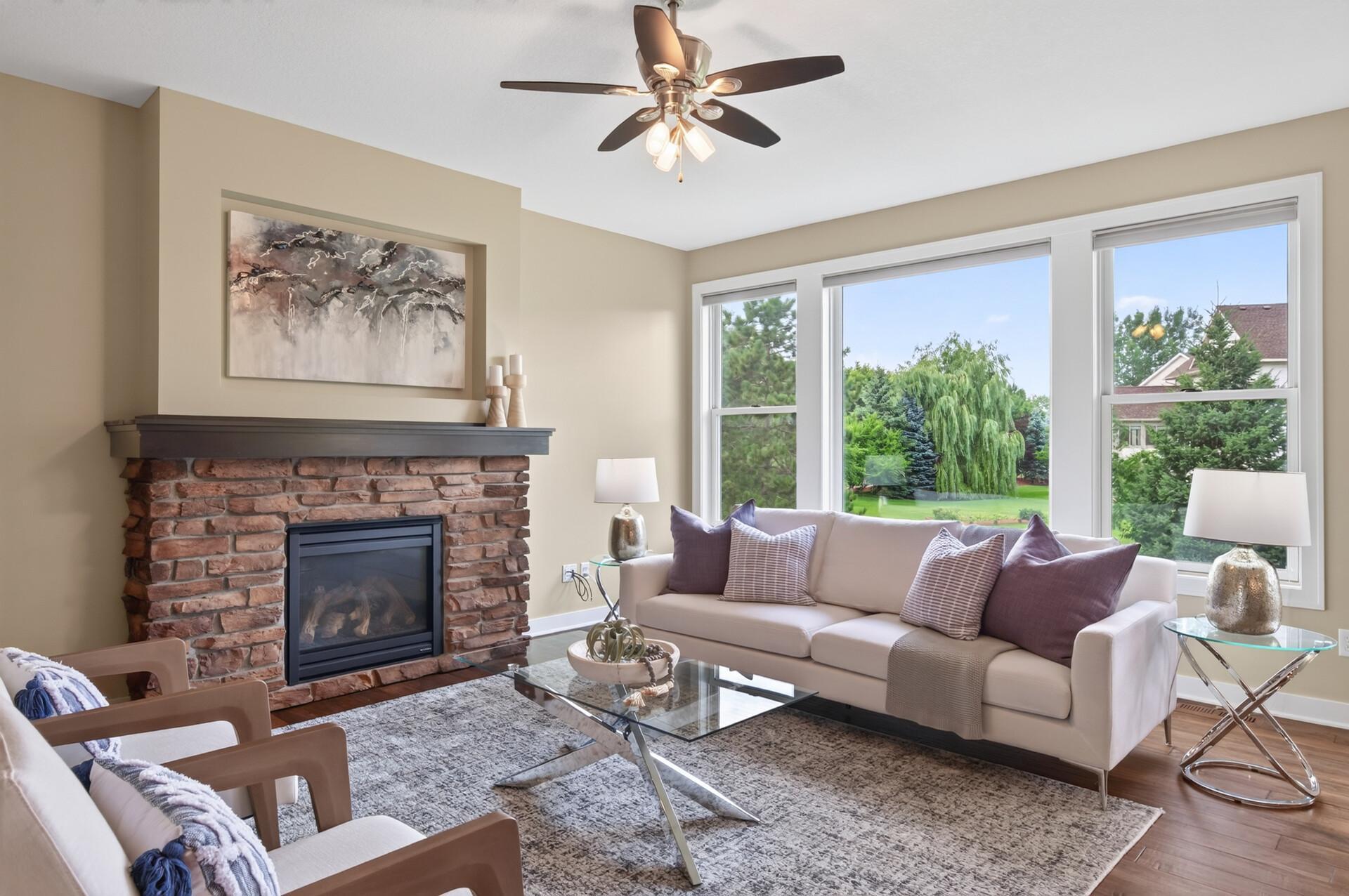 A beautiful stone fireplace creates a warm and inviting focal point.