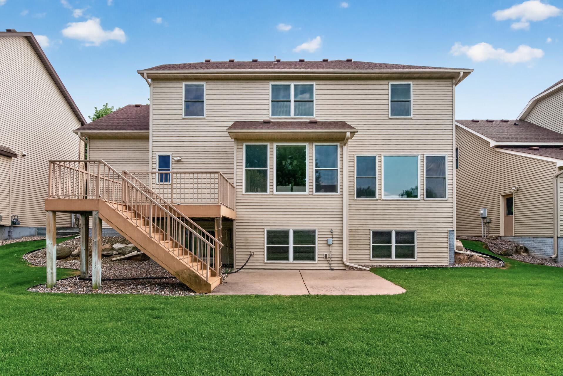 The walkout lower level provides easy access to the backyard.