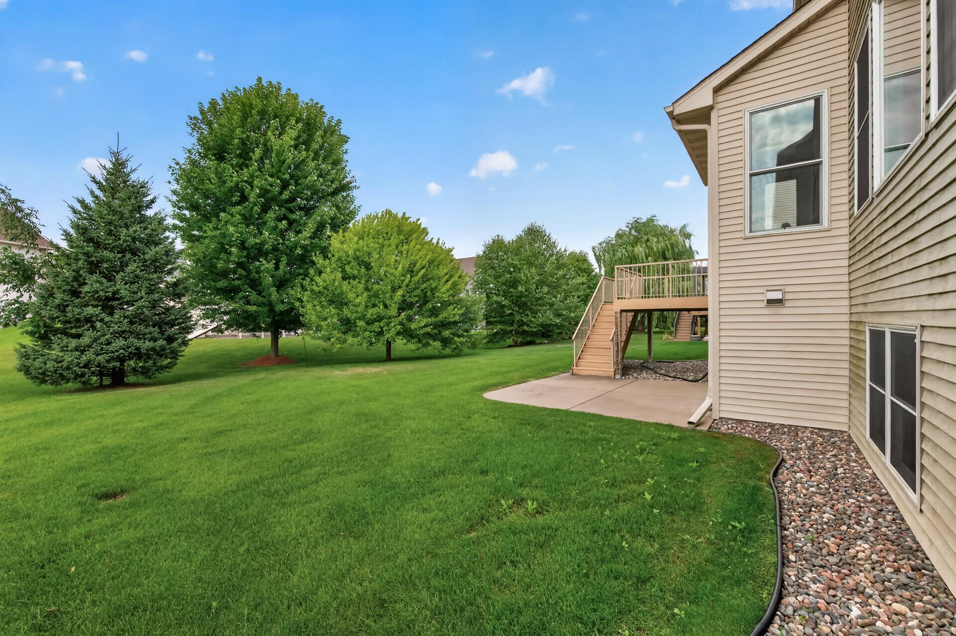 The large backyard offers room to play, garden, or simply unwind.
