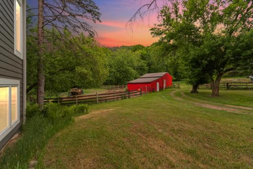 View of horse area and outbuilding with horse stalls